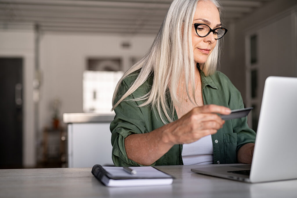 Mature woman making an online purchase