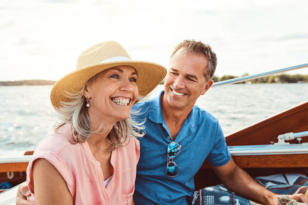 Older couple riding a boat